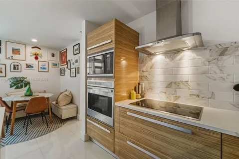 a bathroom with sink and mirror