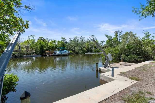 a view of a lake with a yard