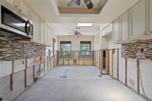 a view of an entryway with kitchen