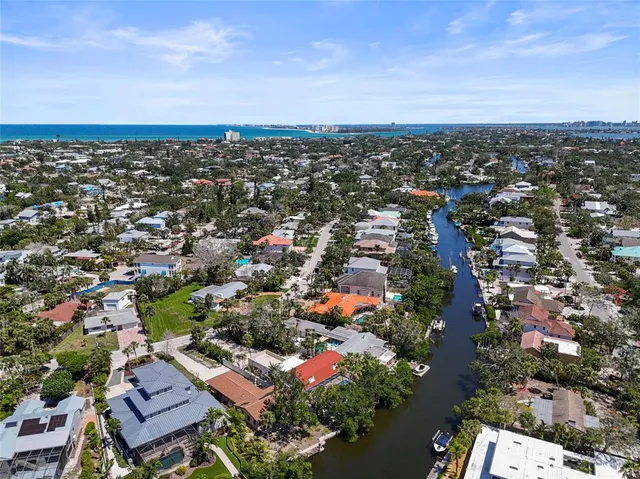 an aerial view of a city with lots of residential buildings