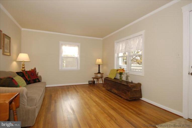 4502 Bennion Road Silver Spring, MD 20906 - Photo 2 of 7 a living room with furniture and a window