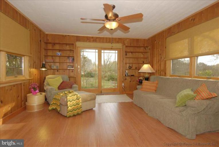 4502 Bennion Road Silver Spring, MD 20906 - Photo 5 of 7 a living room with furniture and a large window