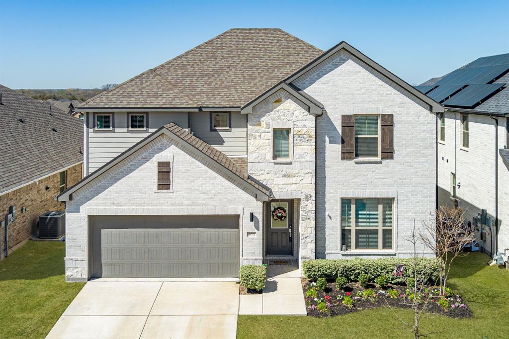4017 Mapleleaf Pass Melissa, TX 75454 - Photo 2 of 32 a front view of a house with a yard