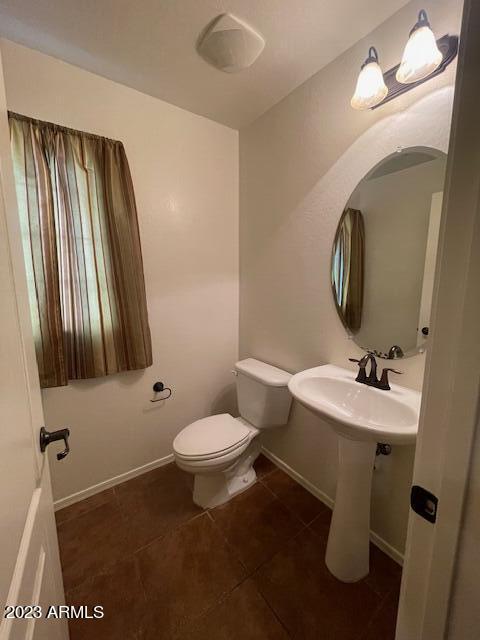 1882 South Seton Avenue Gilbert, AZ 85295 - Photo 11 of 30 a bathroom with a sink toilet and mirror