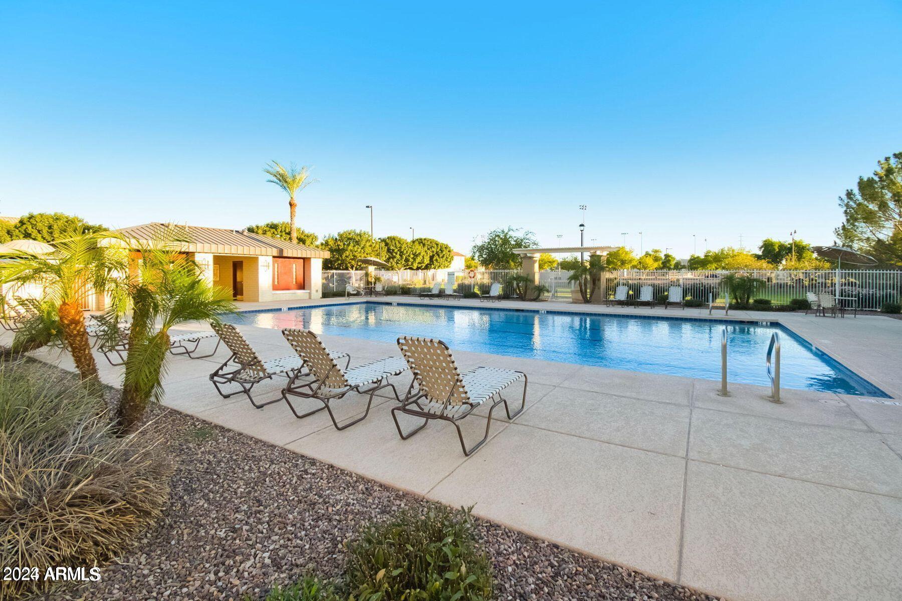 1882 South Seton Avenue Gilbert, AZ 85295 - Photo 13 of 30 a view of a swimming pool with outdoor seating