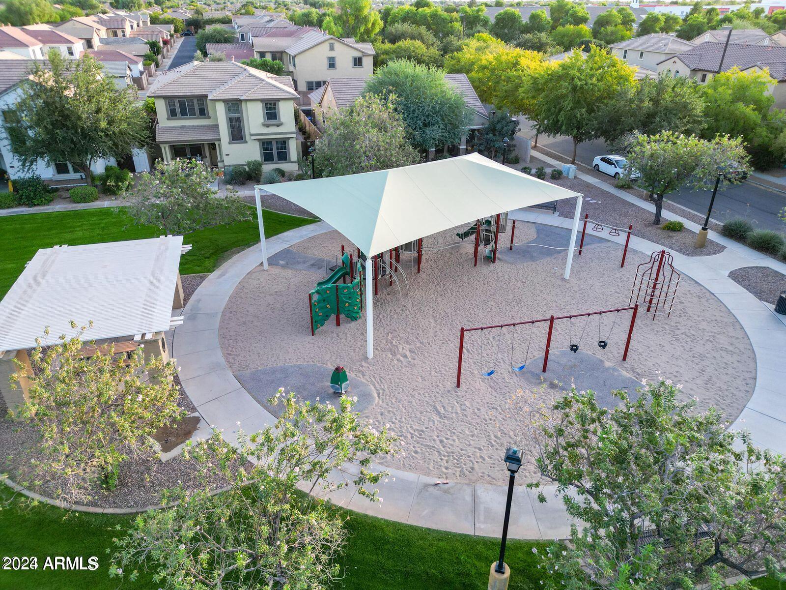 1882 South Seton Avenue Gilbert, AZ 85295 - Photo 16 of 30 an aerial view of a house with garden space and street view