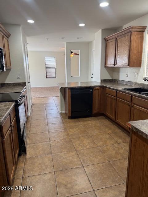 1882 South Seton Avenue Gilbert, AZ 85295 - Photo 19 of 30 a large kitchen with stainless steel appliances granite countertop a stove a sink and a refrigerator