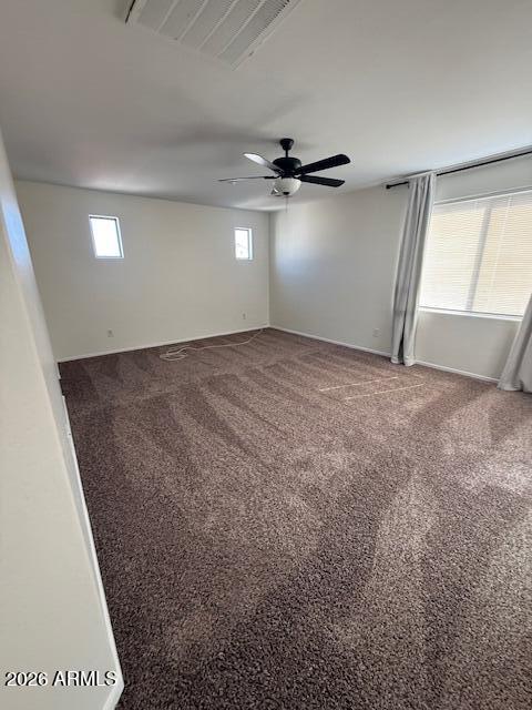 1882 South Seton Avenue Gilbert, AZ 85295 - Photo 24 of 30 an empty room with windows and fan
