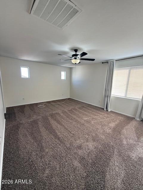 1882 South Seton Avenue Gilbert, AZ 85295 - Photo 25 of 30 an empty room with a empty space windows and ceiling fan