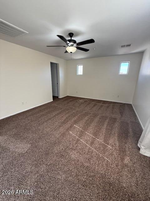 1882 South Seton Avenue Gilbert, AZ 85295 - Photo 26 of 30 an empty room with windows and fan chandelier fan