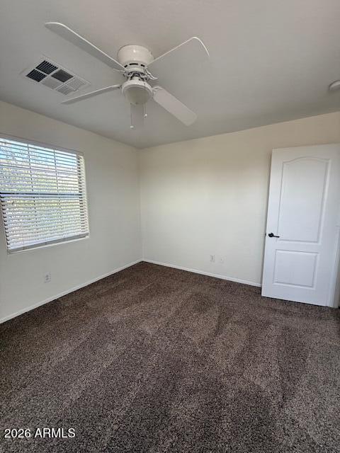 1882 South Seton Avenue Gilbert, AZ 85295 - Photo 29 of 30 an empty room with windows and fan