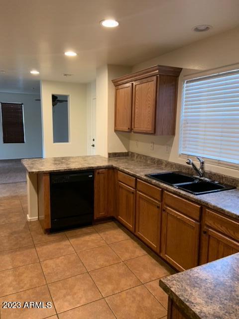 1882 South Seton Avenue Gilbert, AZ 85295 - Photo 7 of 30 a kitchen with stainless steel appliances granite countertop a stove a sink and a microwave