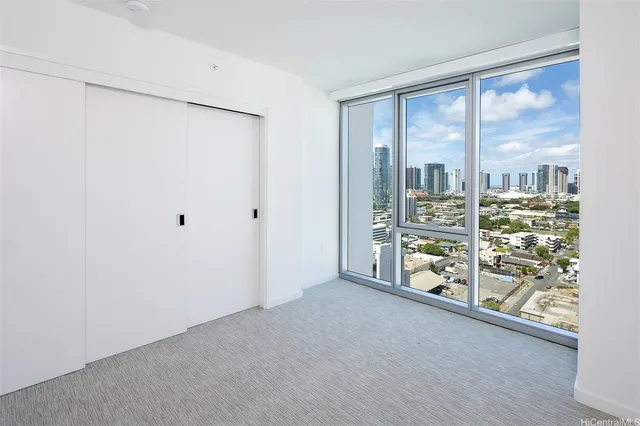 a view of an empty room with a window