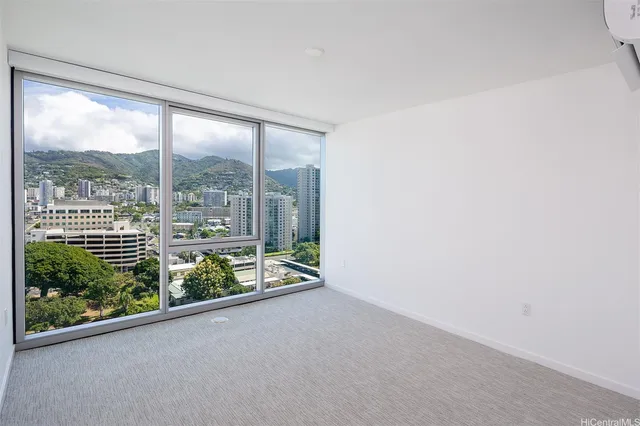 a view of a room with a large window