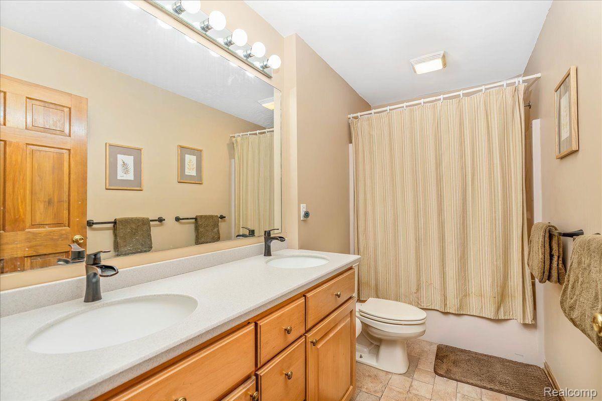 21851 Prince Road Belleville, MI 48111 - Photo 35 of 59 Full bath on second floor with new vanity top