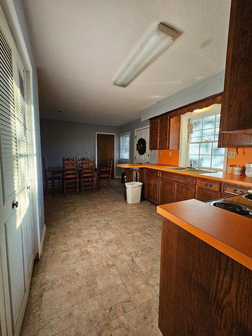 50 Valley Mill Road Swoope, VA 24479 - Photo 54 of 66 a kitchen with stainless steel appliances granite countertop a sink and cabinets