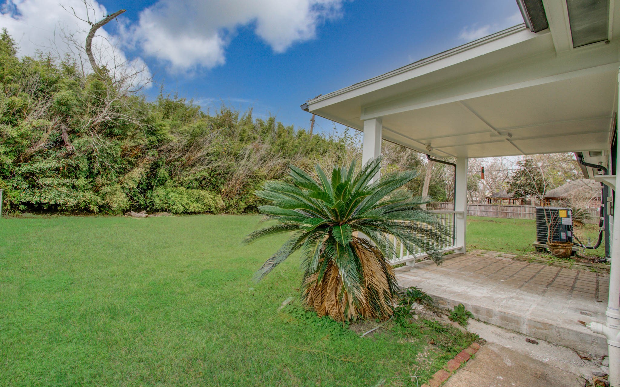 2417 Pecan Street Dickinson, TX 77539 - Photo 39 of 43 a view of a backyard with a garden