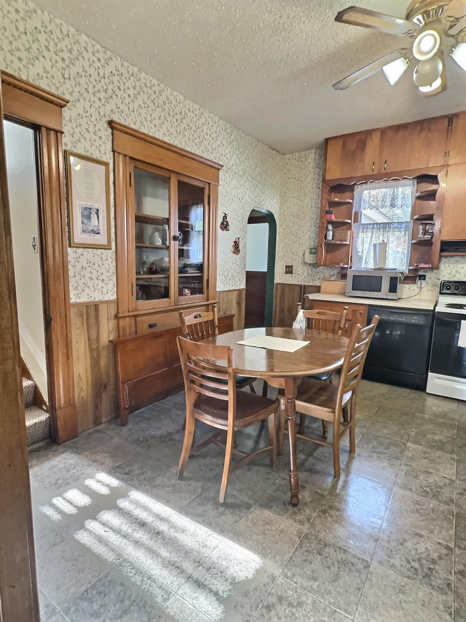 136 East Main Street Brook, IN 47922 - Photo 13 of 25 a view of a dining room with furniture window and outside view