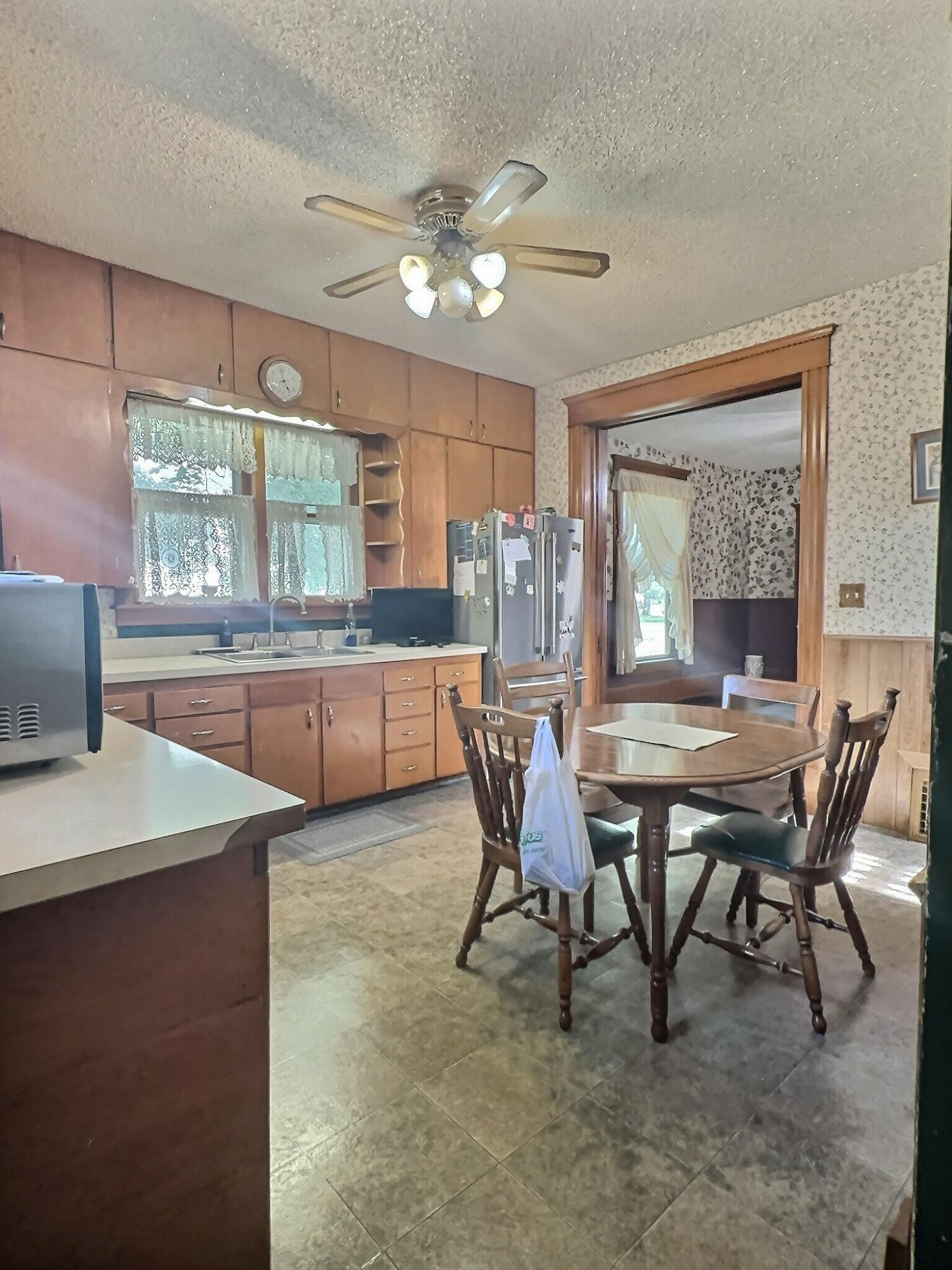 136 East Main Street Brook, IN 47922 - Photo 15 of 25 a dining room with furniture and window
