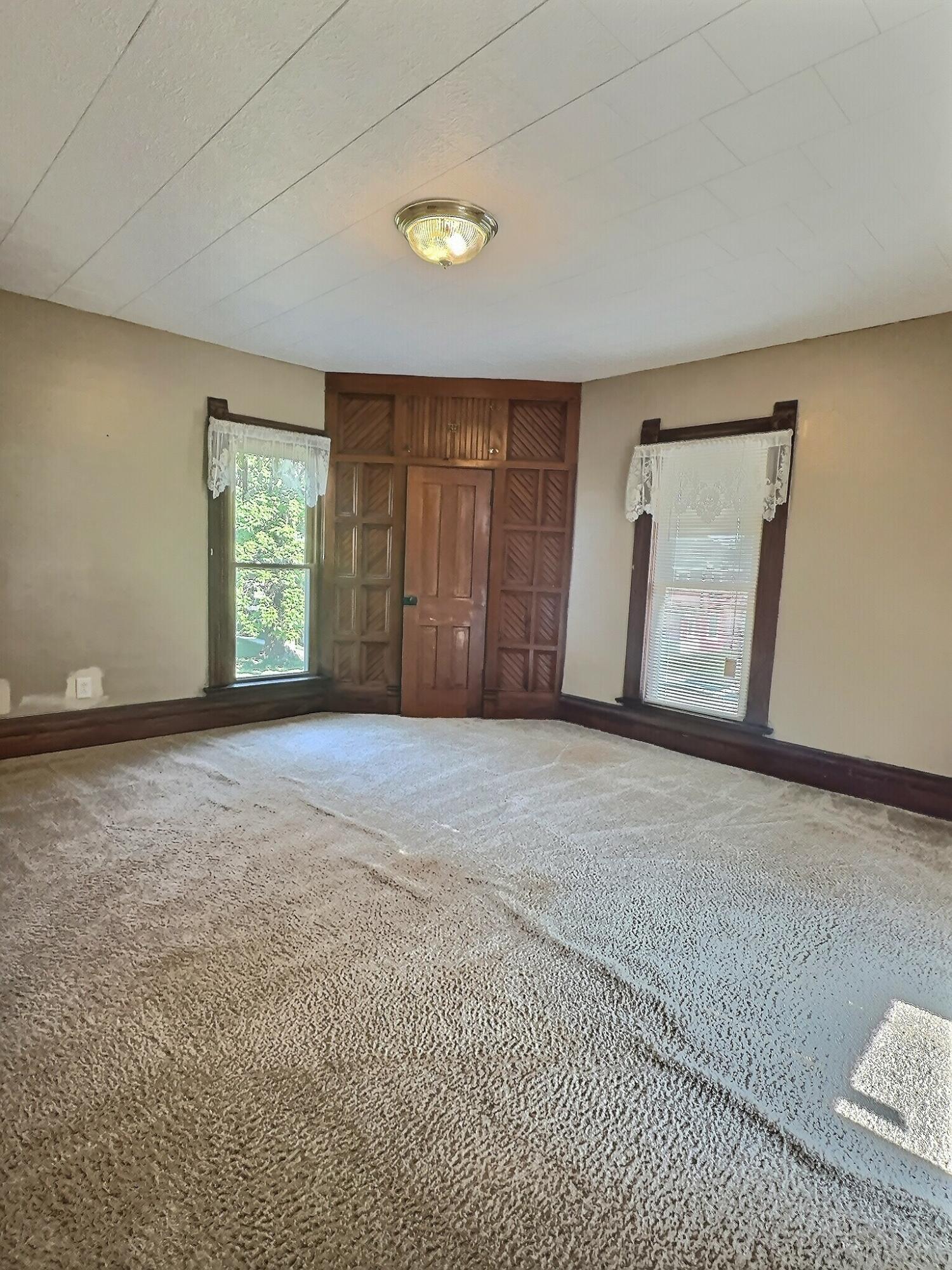 136 East Main Street Brook, IN 47922 - Photo 24 of 25 a view of an empty room with a window