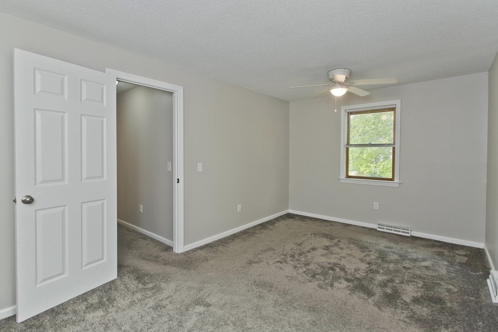 108 Odion Avenue Springfield, MA 01118 - Photo 12 of 24 an empty room with windows