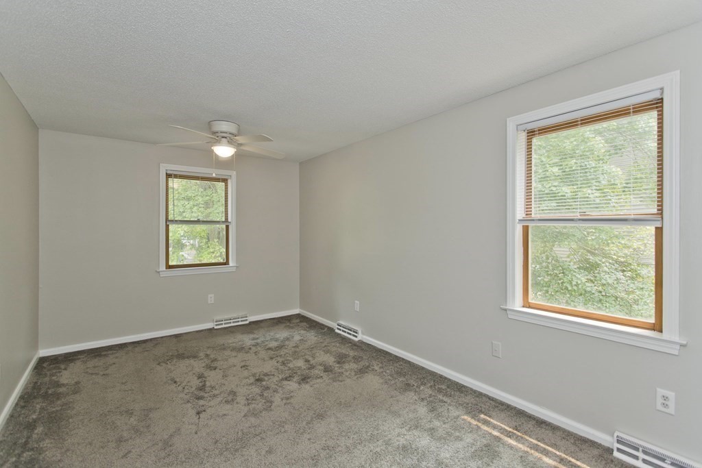 108 Odion Avenue Springfield, MA 01118 - Photo 13 of 24 an empty room with a window