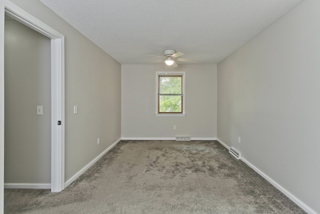 108 Odion Avenue Springfield, MA 01118 - Photo 14 of 24 an empty room with windows