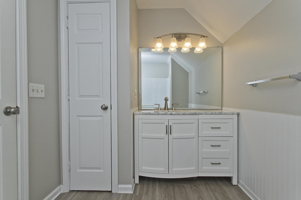 108 Odion Avenue Springfield, MA 01118 - Photo 19 of 24 a bathroom with a sink and a mirror