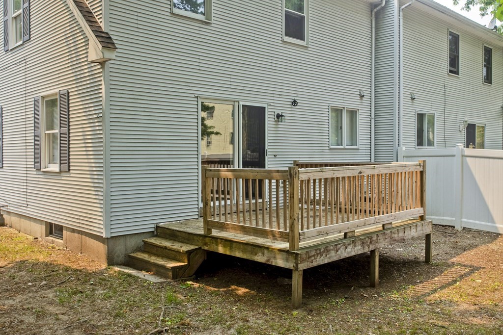 108 Odion Avenue Springfield, MA 01118 - Photo 23 of 24 a view of a house with a wooden deck