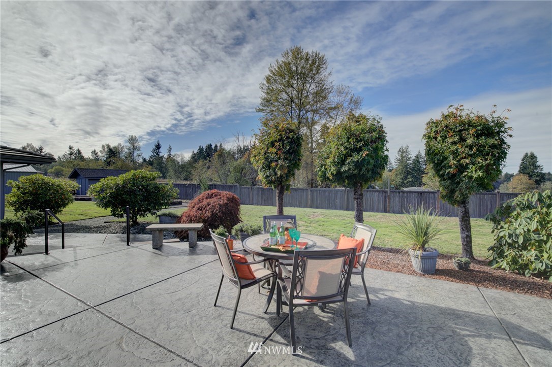 19415 Southeast 141st Street Renton, WA 98059 - Photo 36 of 39 an outdoor space with furniture and garden