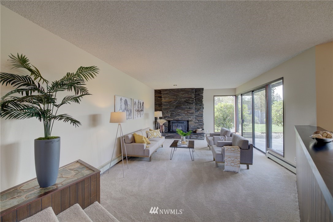 19415 Southeast 141st Street Renton, WA 98059 - Photo 10 of 39 a living room with furniture and a potted plant