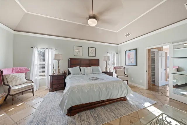 a view of a dining room with furniture wooden floor and chandelier