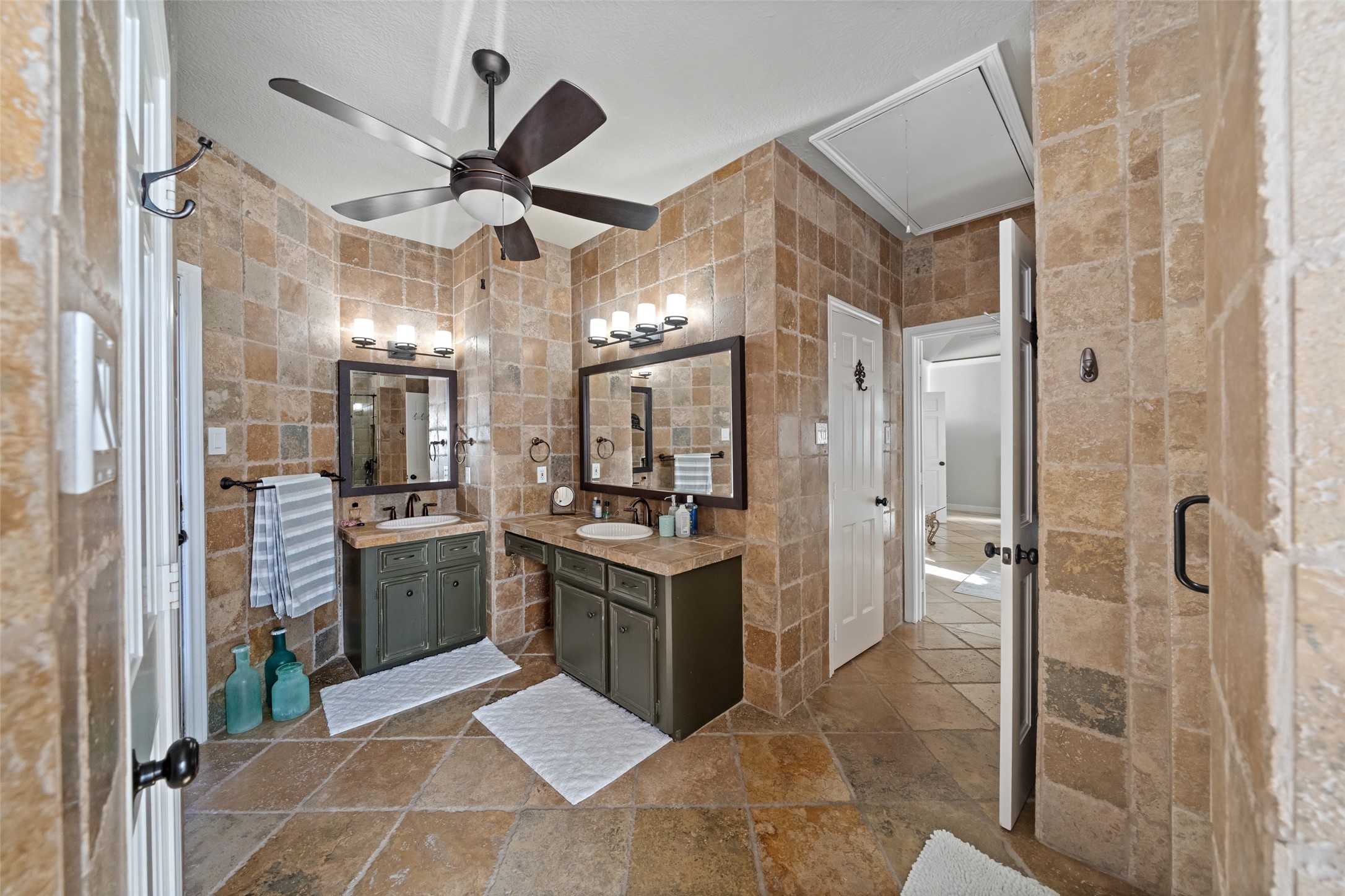8314 Atascocita Lake Way Humble, TX 77346 - Photo 15 of 47 a kitchen with stainless steel appliances granite countertop a sink and refrigerator