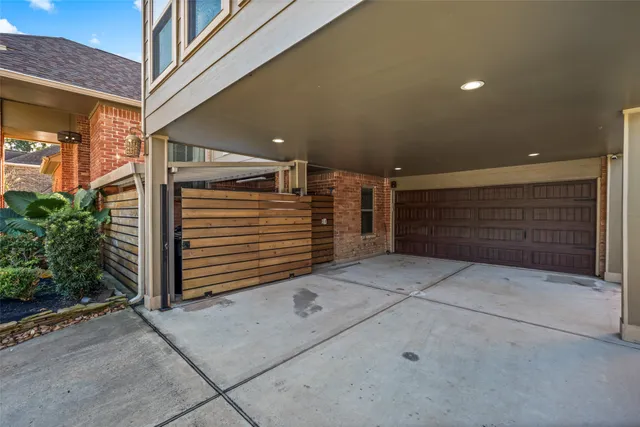 an aerial view of house with yard swimming pool and outdoor seating