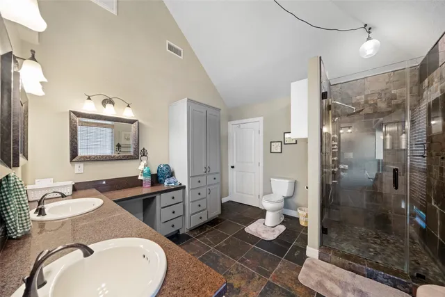 a view of a house with swimming pool and sitting area