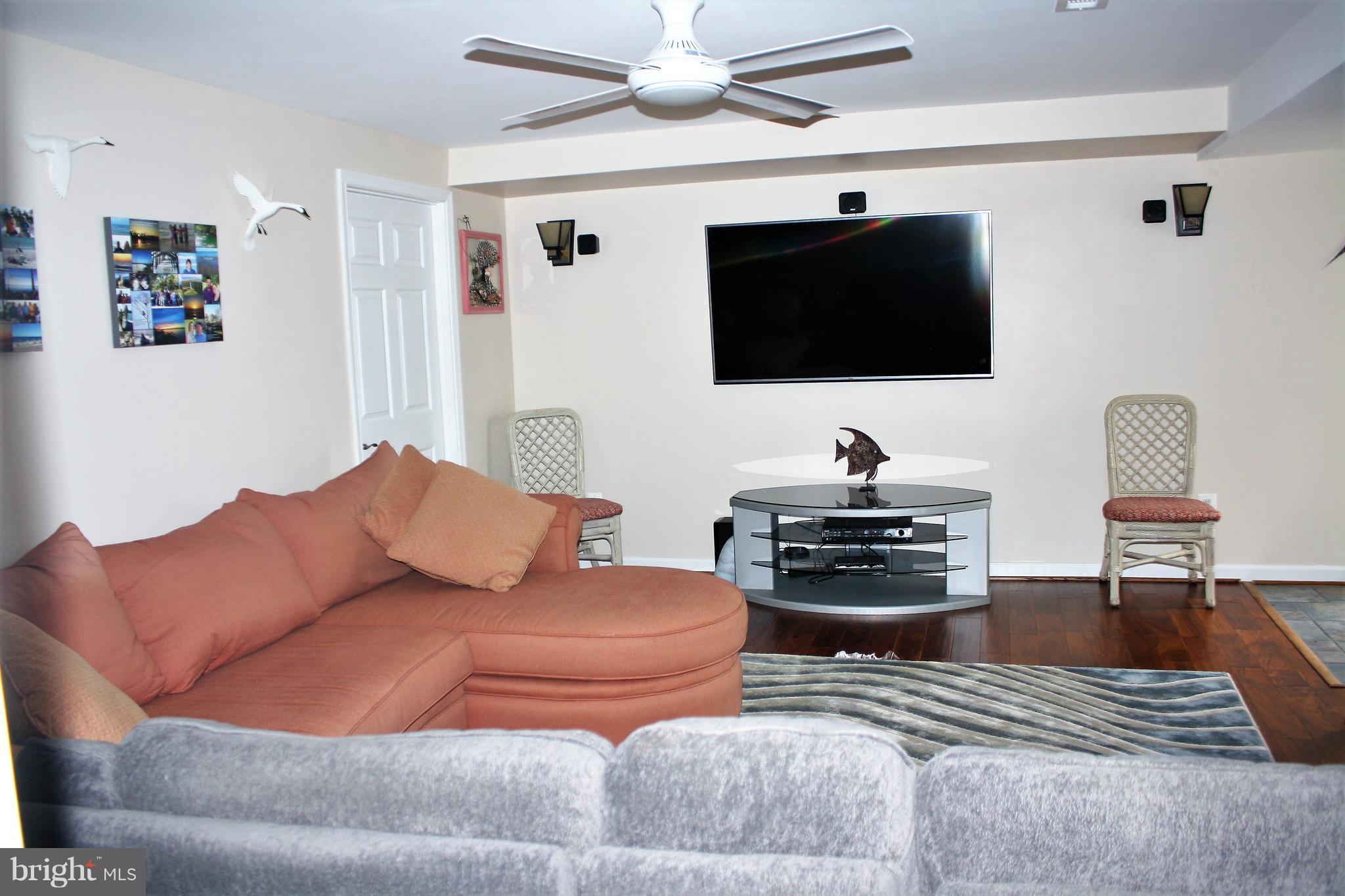148 Ruth Court Strasburg, VA 22657 - Photo 21 of 30 a living room with furniture and a flat screen tv