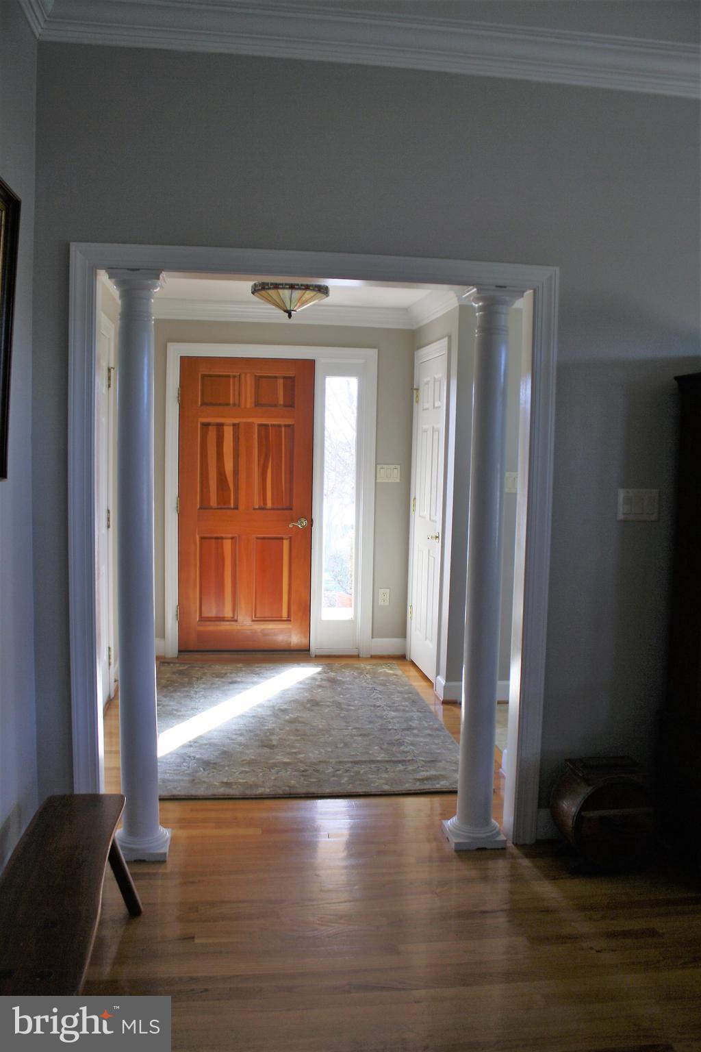 148 Ruth Court Strasburg, VA 22657 - Photo 4 of 30 a view of a hallway with wooden floor