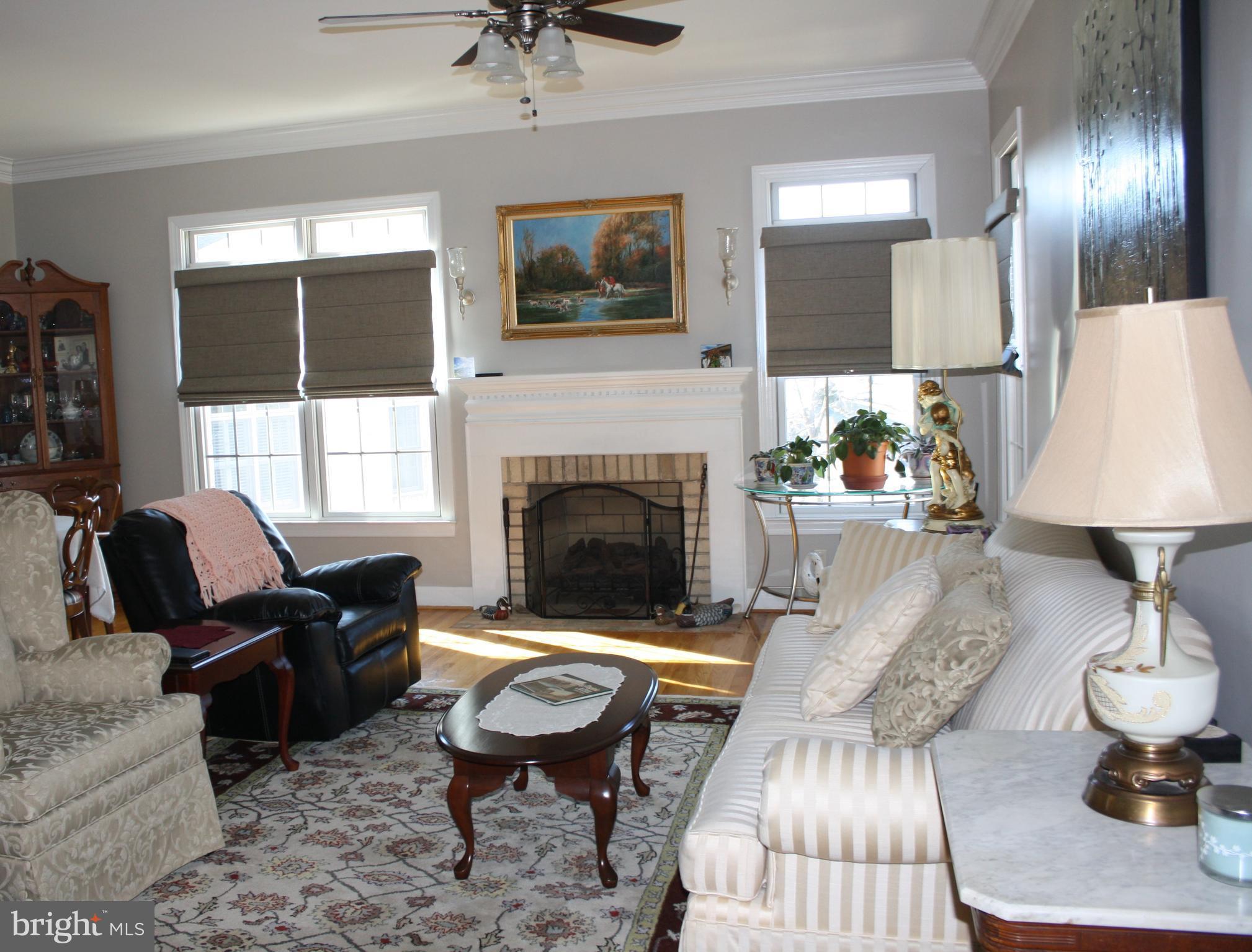 148 Ruth Court Strasburg, VA 22657 - Photo 9 of 30 a living room with furniture fireplace and window