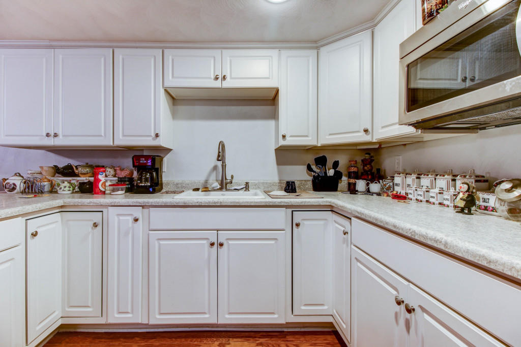 1400 Morgans Mill Road Goodview, VA 24095 - Photo 18 of 21 a kitchen with cabinets appliances and a sink