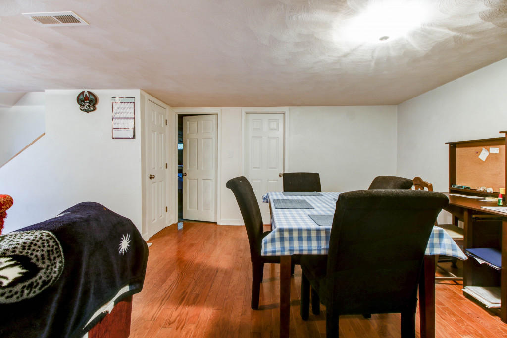 1400 Morgans Mill Road Goodview, VA 24095 - Photo 19 of 21 a bedroom with a bed and a desk