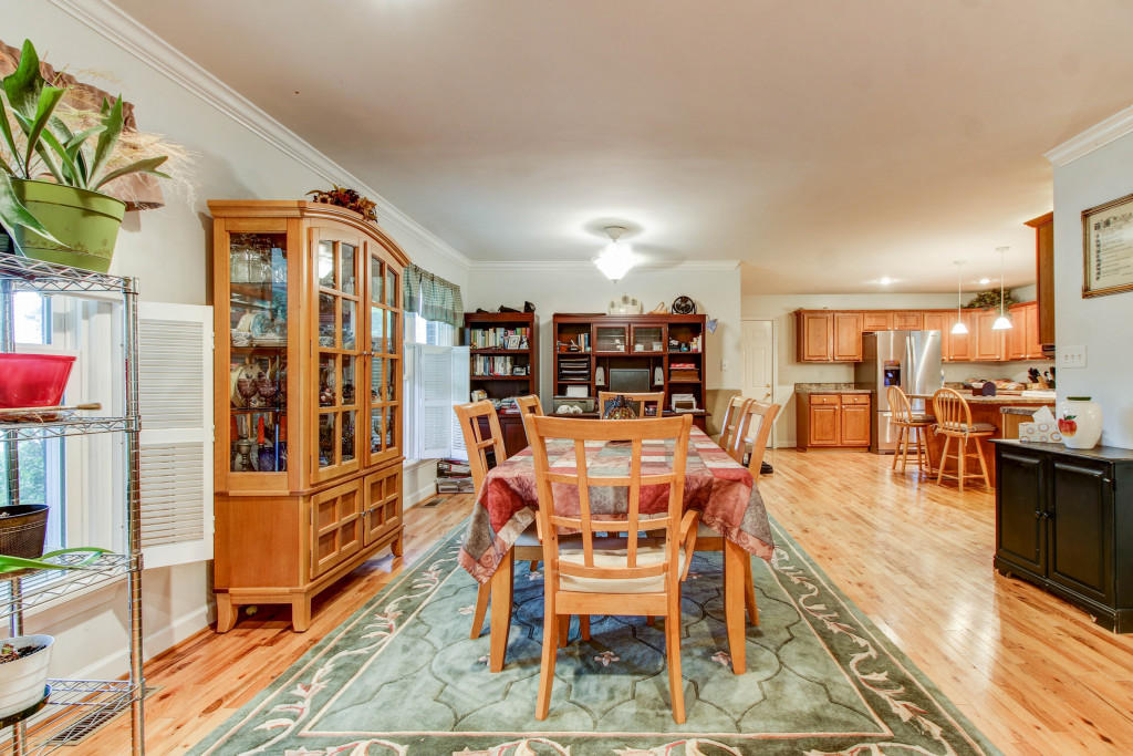 1400 Morgans Mill Road Goodview, VA 24095 - Photo 6 of 21 a dining room with furniture and wooden floor