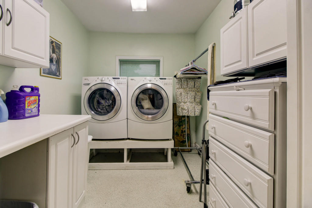 1400 Morgans Mill Road Goodview, VA 24095 - Photo 10 of 21 a utility room with dryer washer and closet