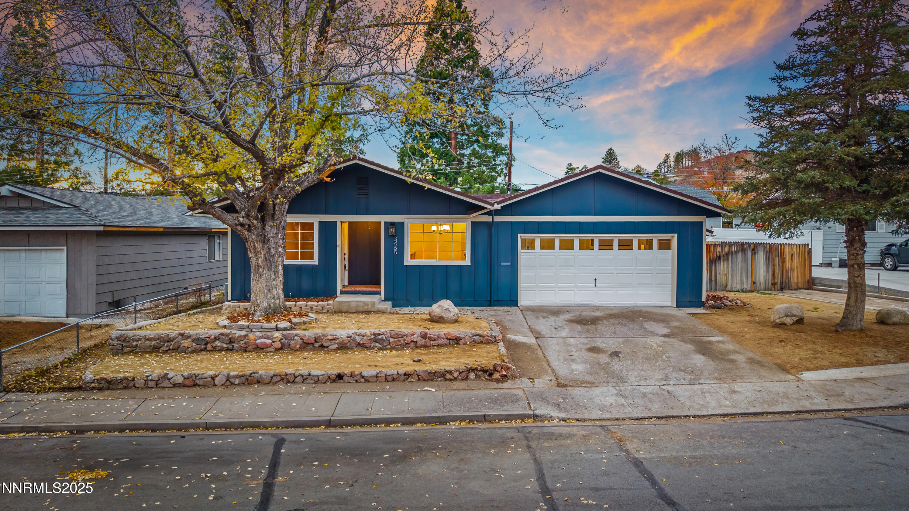 3465 Dawn Circle Sparks, NV 89431 - Photo 1 of 17 a house with a tree in front of it