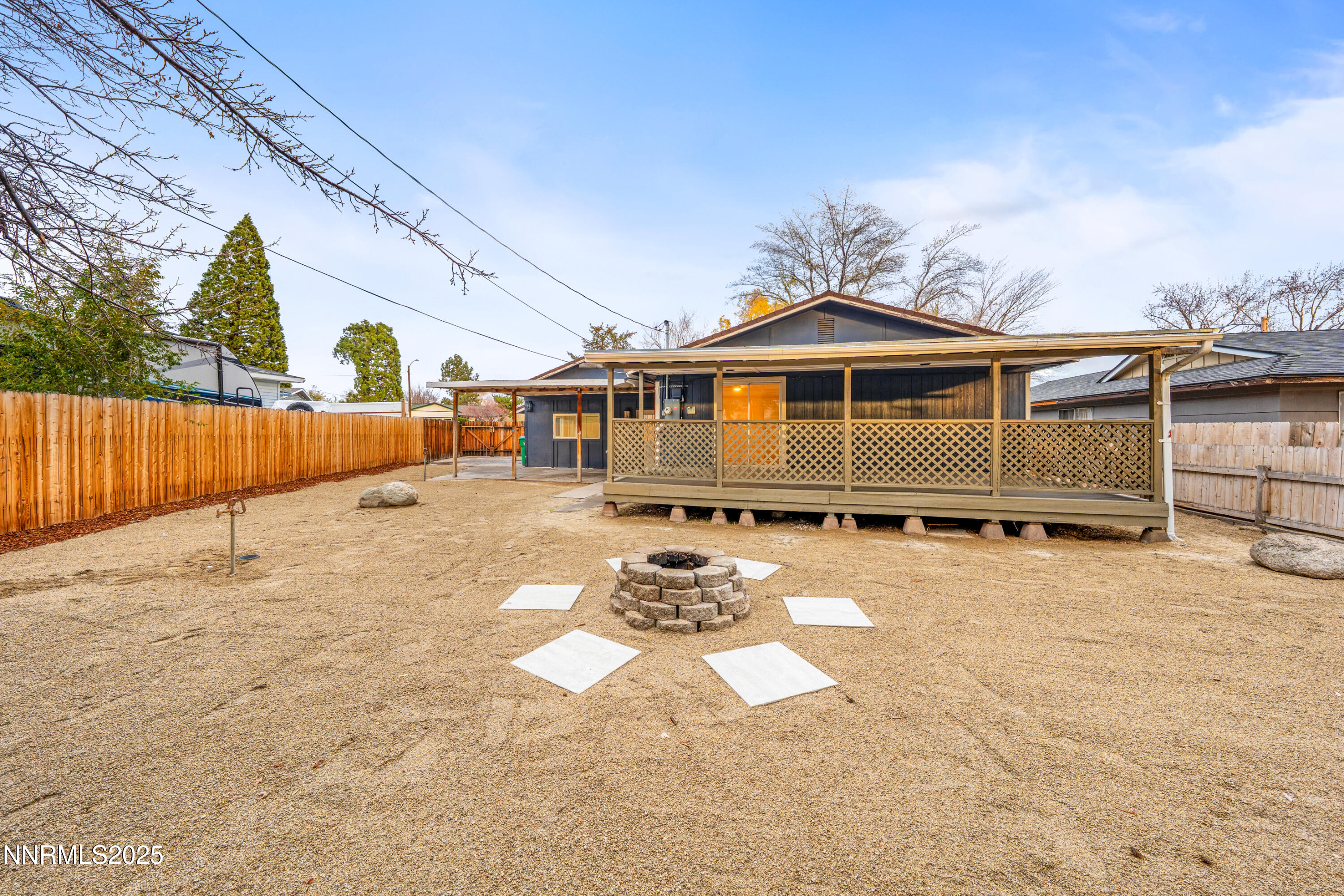 3465 Dawn Circle Sparks, NV 89431 - Photo 12 of 17 a front view of a house with a yard