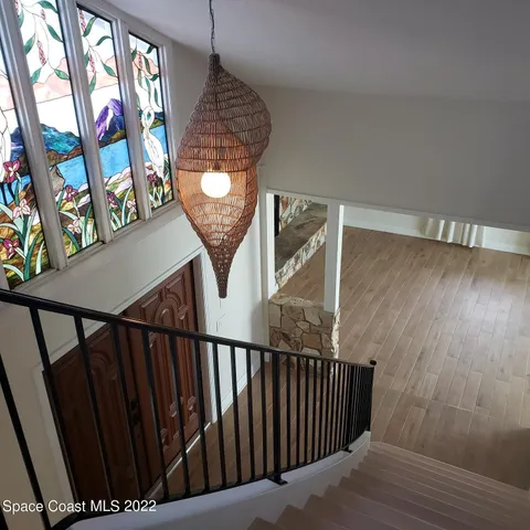 a view of wooden floor with a fireplace