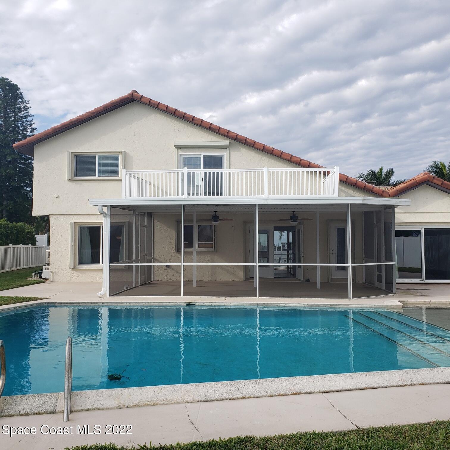 215 Andros Avenue Cocoa Beach, FL 32931 - Photo 37 of 55 a view of outdoor space yard and porch