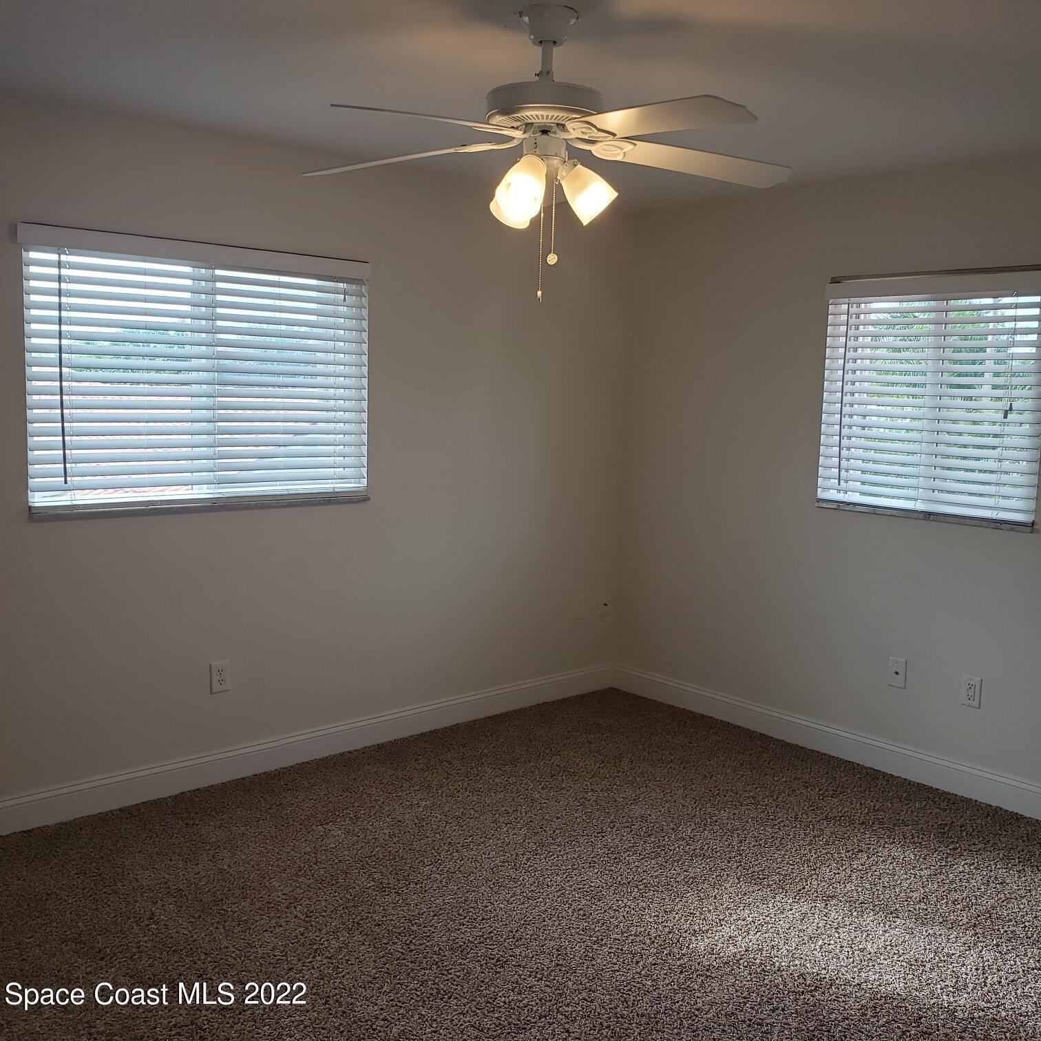 215 Andros Avenue Cocoa Beach, FL 32931 - Photo 44 of 53 an empty room with a window