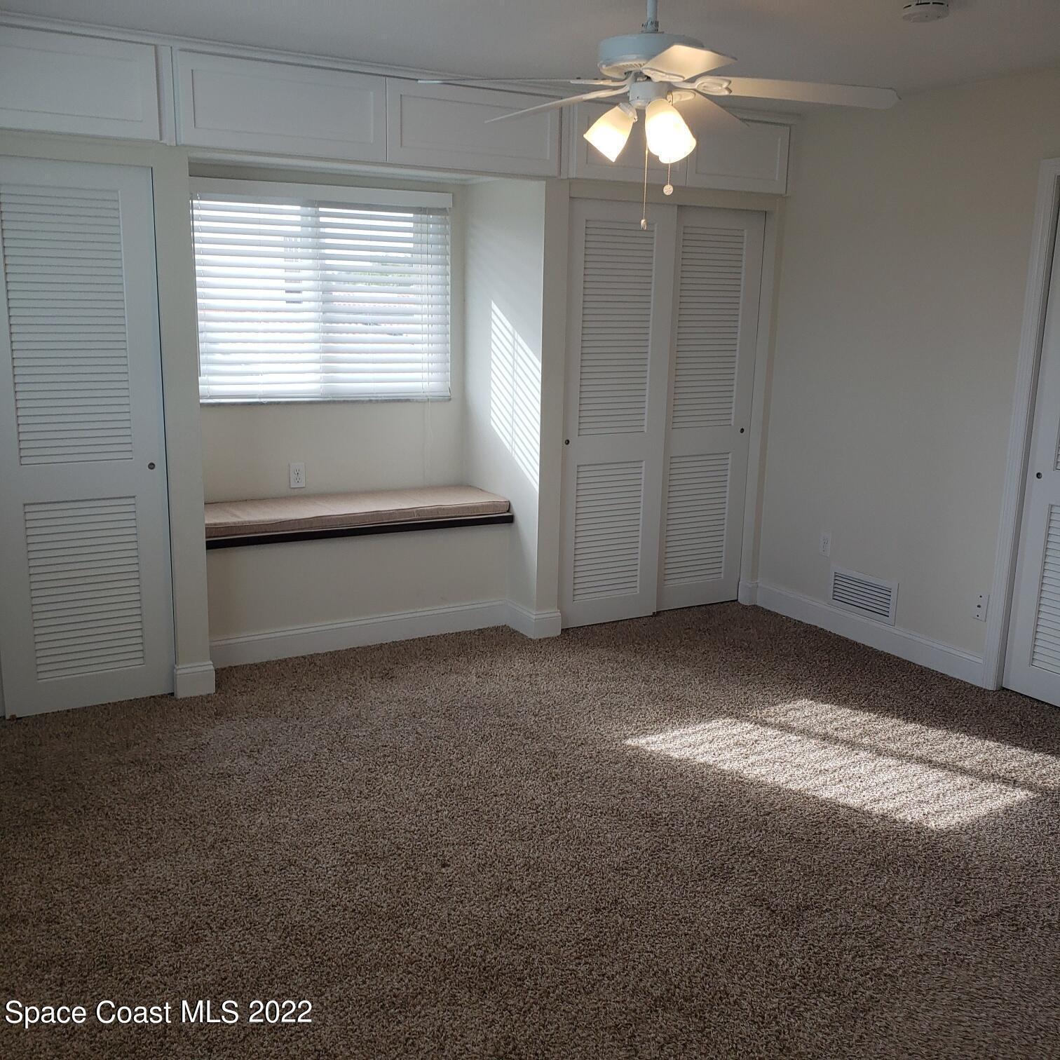 215 Andros Avenue Cocoa Beach, FL 32931 - Photo 47 of 55 a view of empty room with window