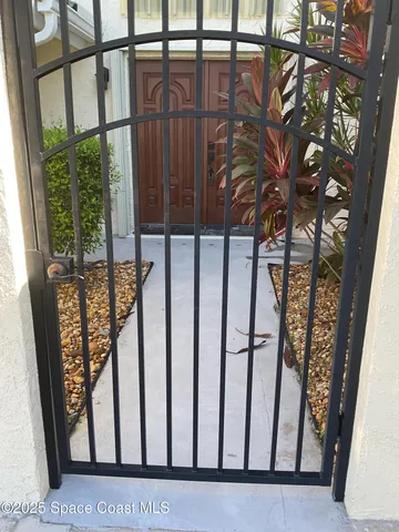 a view of a swimming pool and a chair