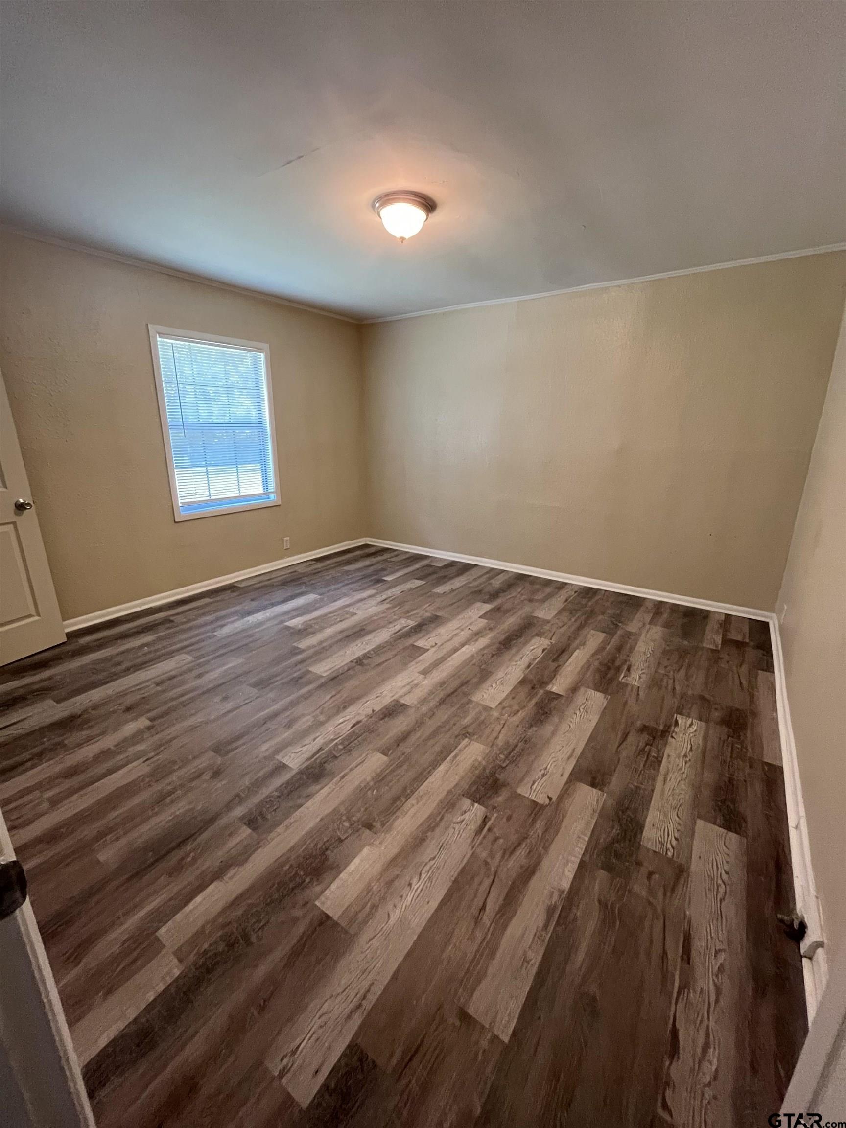3312 North Luberta Street Tyler, TX 75702 - Photo 7 of 8 a view of an empty room